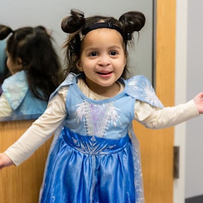 Athena smiling at the Cleft and Craniofacial Clinic.