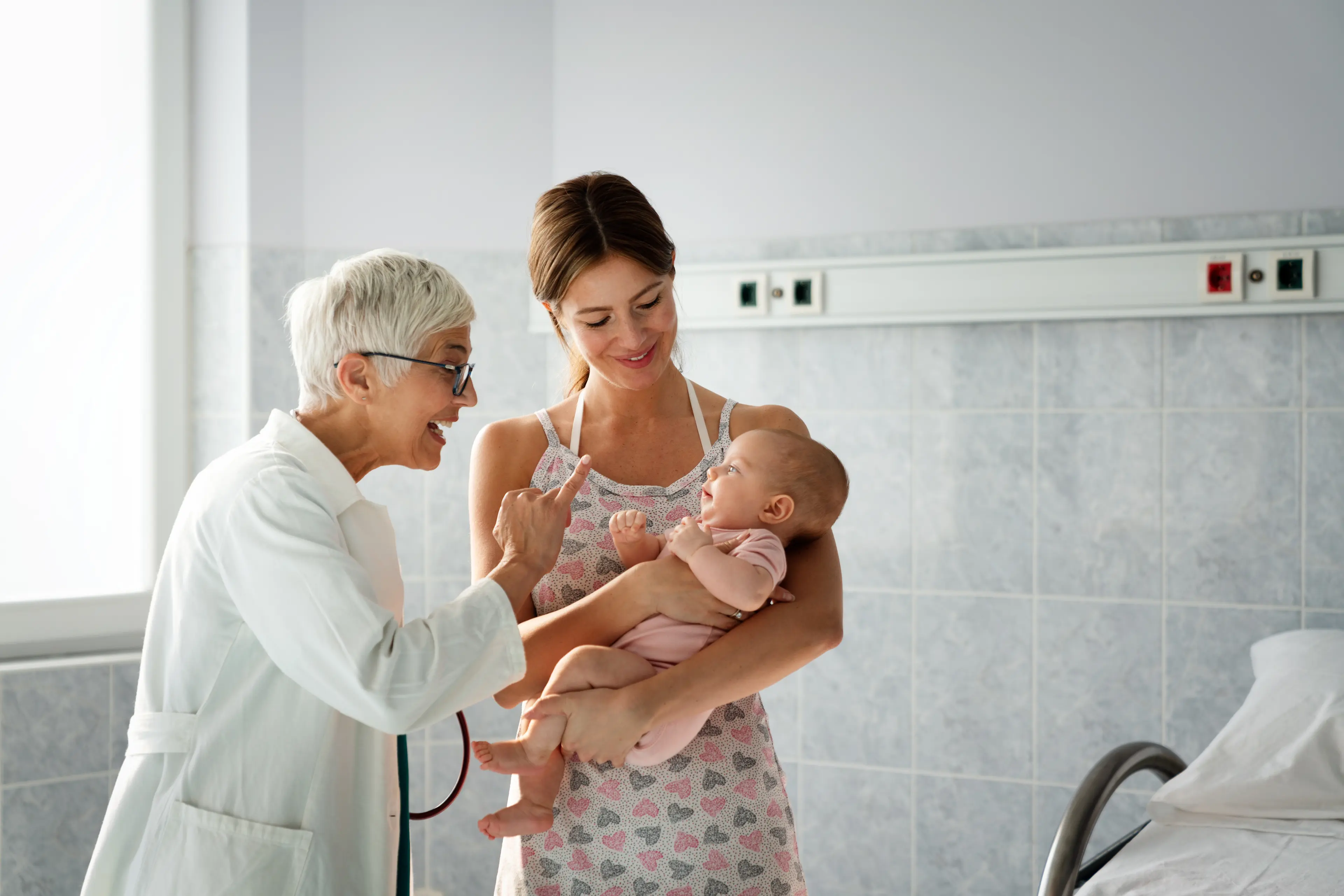 pediatric doctor exams little baby