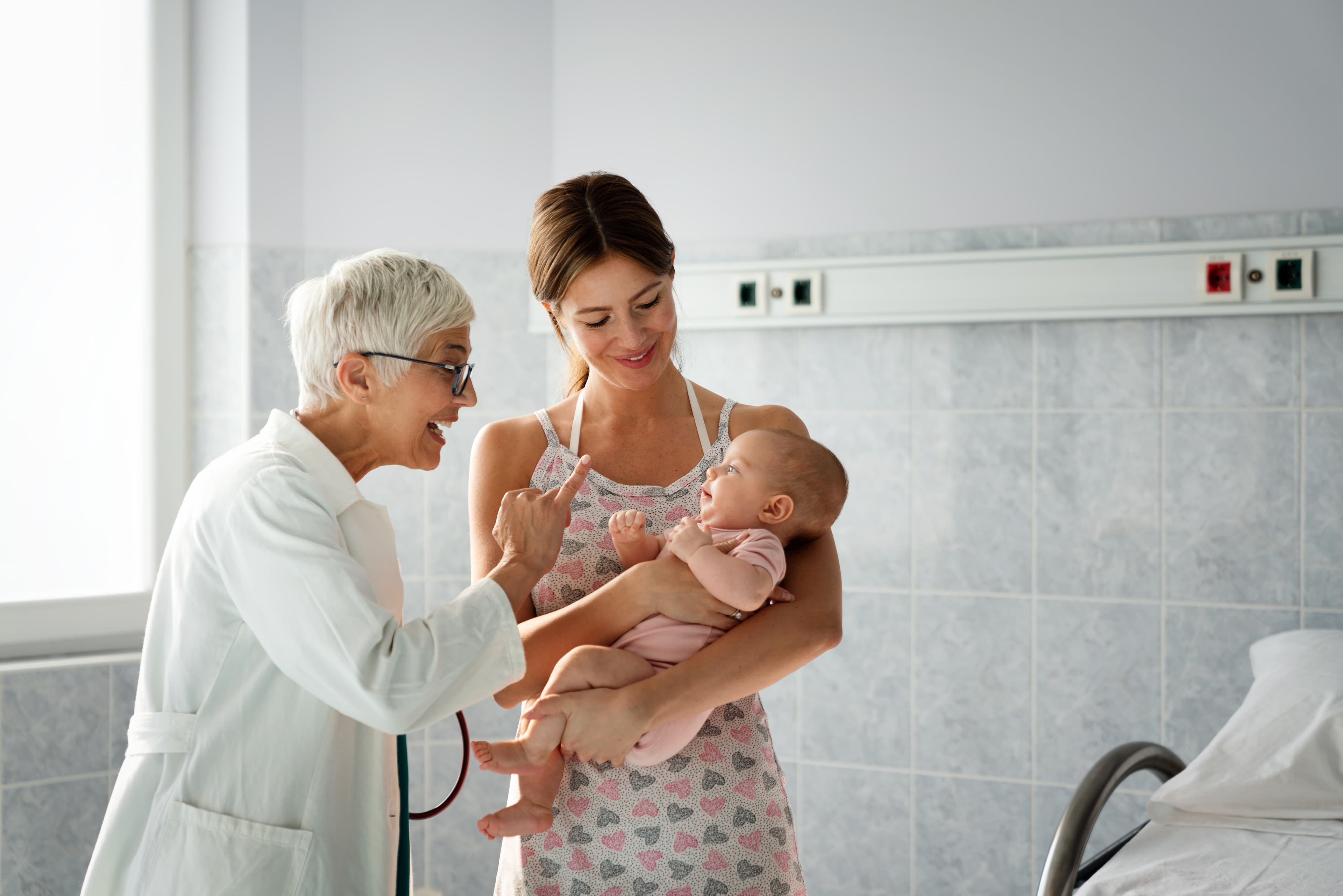 pediatric doctor exams little baby
